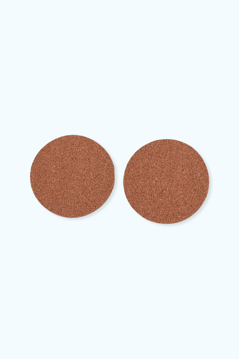 Baksidan är två glasunderlägg