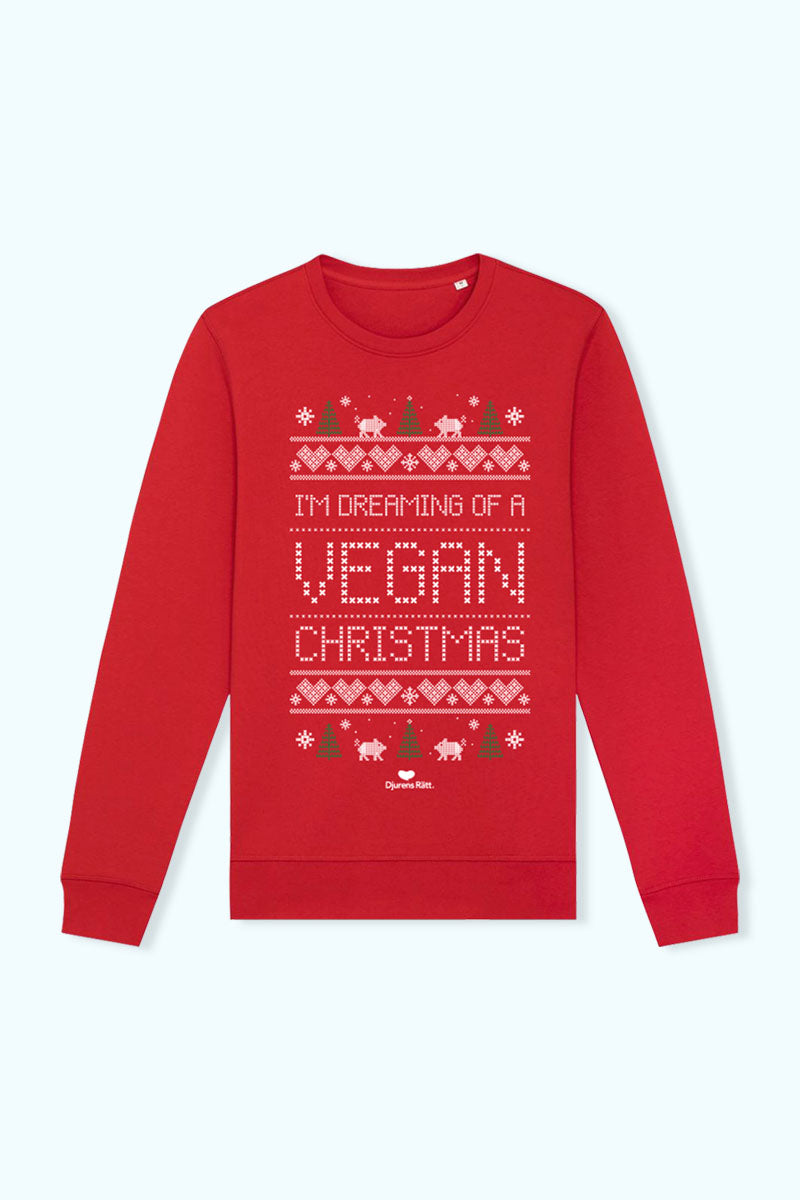Jultröja med juliga illustrationer och texten ”I’m dreaming of a vegan Christmas” samt Djurens Rätts logga