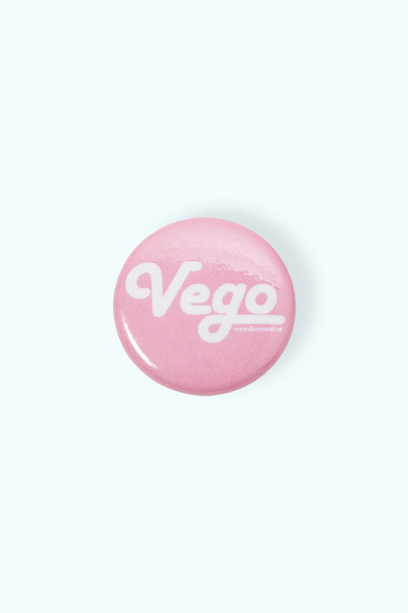 Rosa liten pin med texten Vego