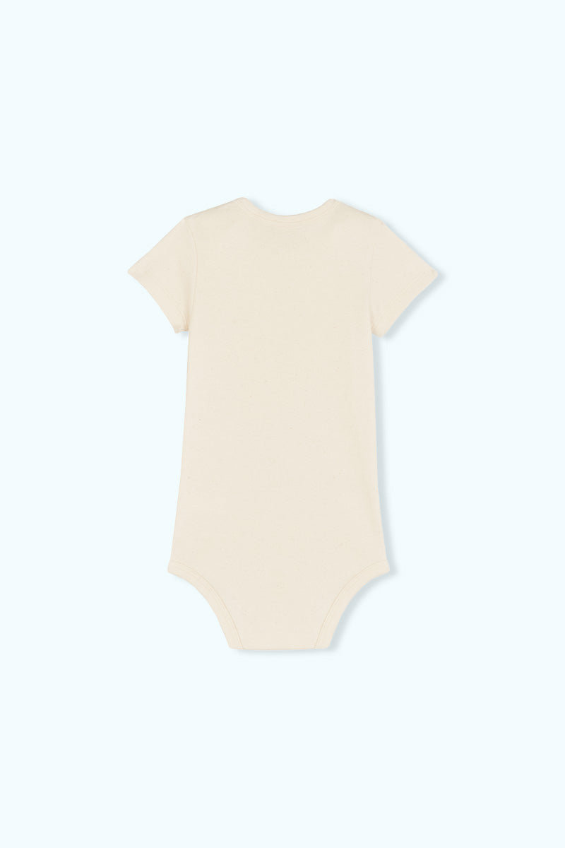 Baksidan av en beige baby body